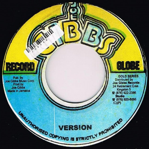 Dennis Brown - Stop The Fussing And Figthing