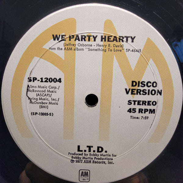 L.T.D. - We Party Hearty / (Every Time I Turn Around) Back In Love Again