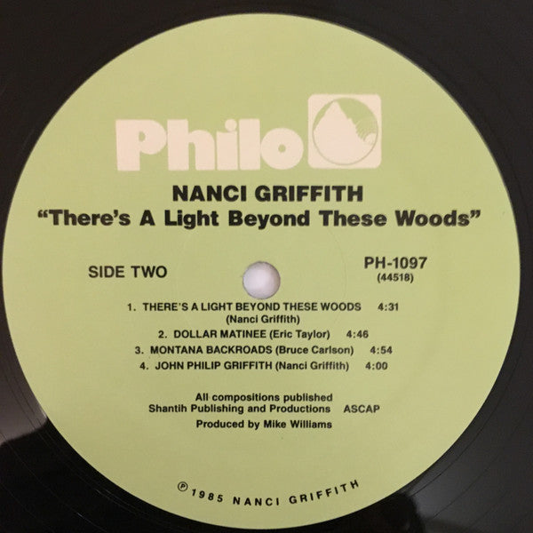 Nanci Griffith - There's A Light Beyond These Woods