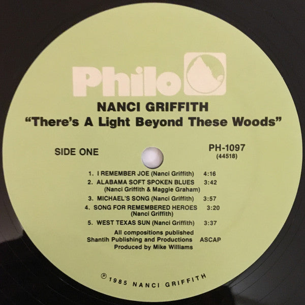 Nanci Griffith - There's A Light Beyond These Woods